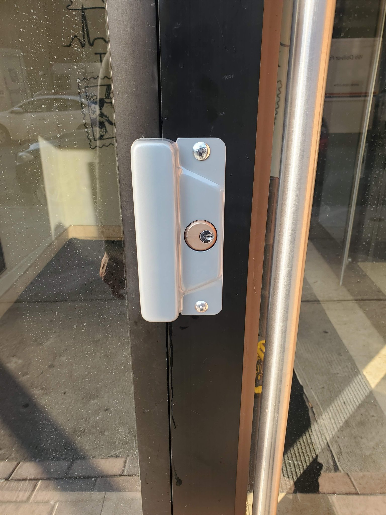 Commercial glass storefront door lock